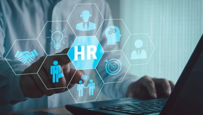 Leveraging Technology for Effective Workforce Management - an HR logo hovering over a laptop computer.