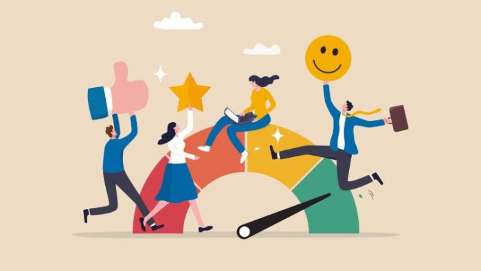 7 Employee Engagement Strategies for a Distributed Workforce - a group of engaged employees happy in the workplace.