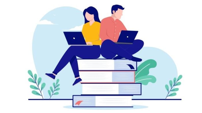 9 Strategies for Balancing Work and School - two people sitting on a giant pile of books while working on their laptop computers.