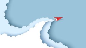 How to Write a Cover Letter That Explains a Career Pivot - a paper airplane making a sharp turn.